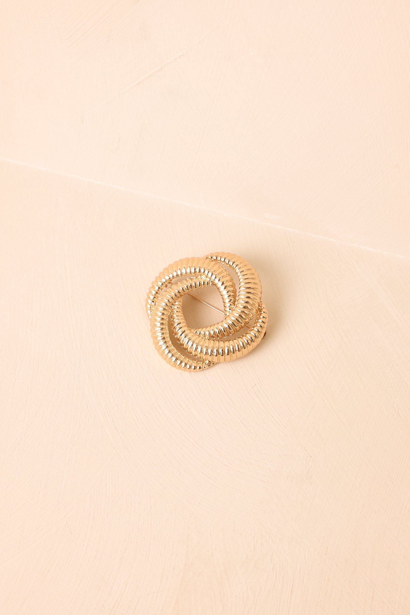 Bound to Impress Gold Ribbed Knot Brooch